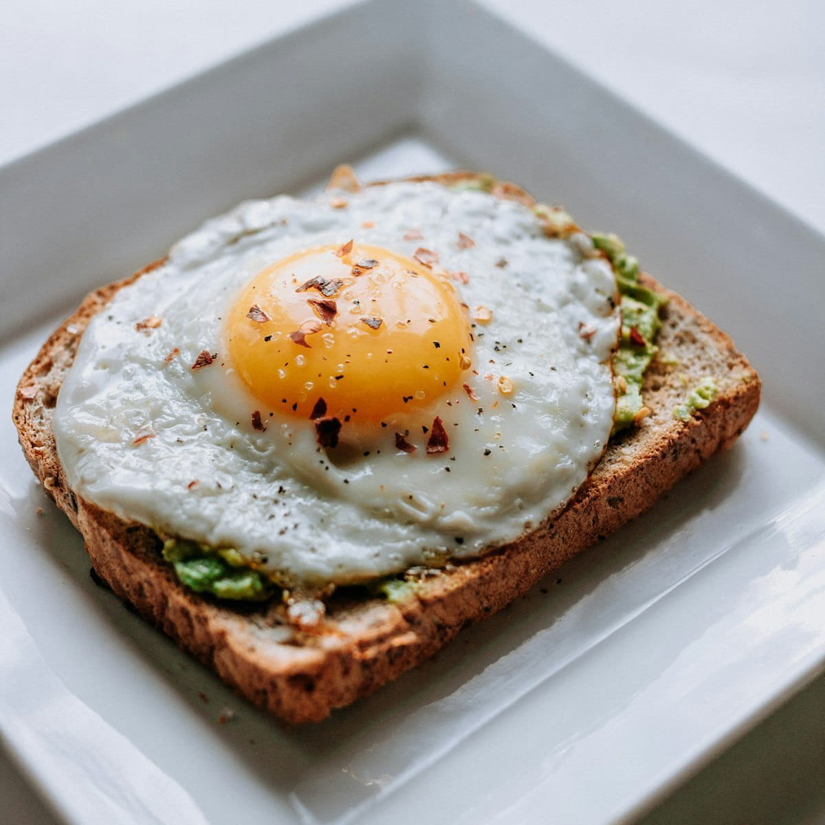 Scrambled eggs on whole wheat toast under $1